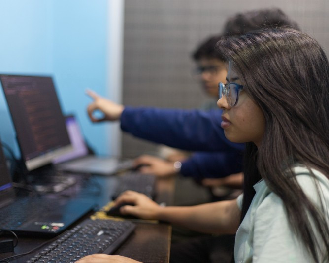 Student working on web design project